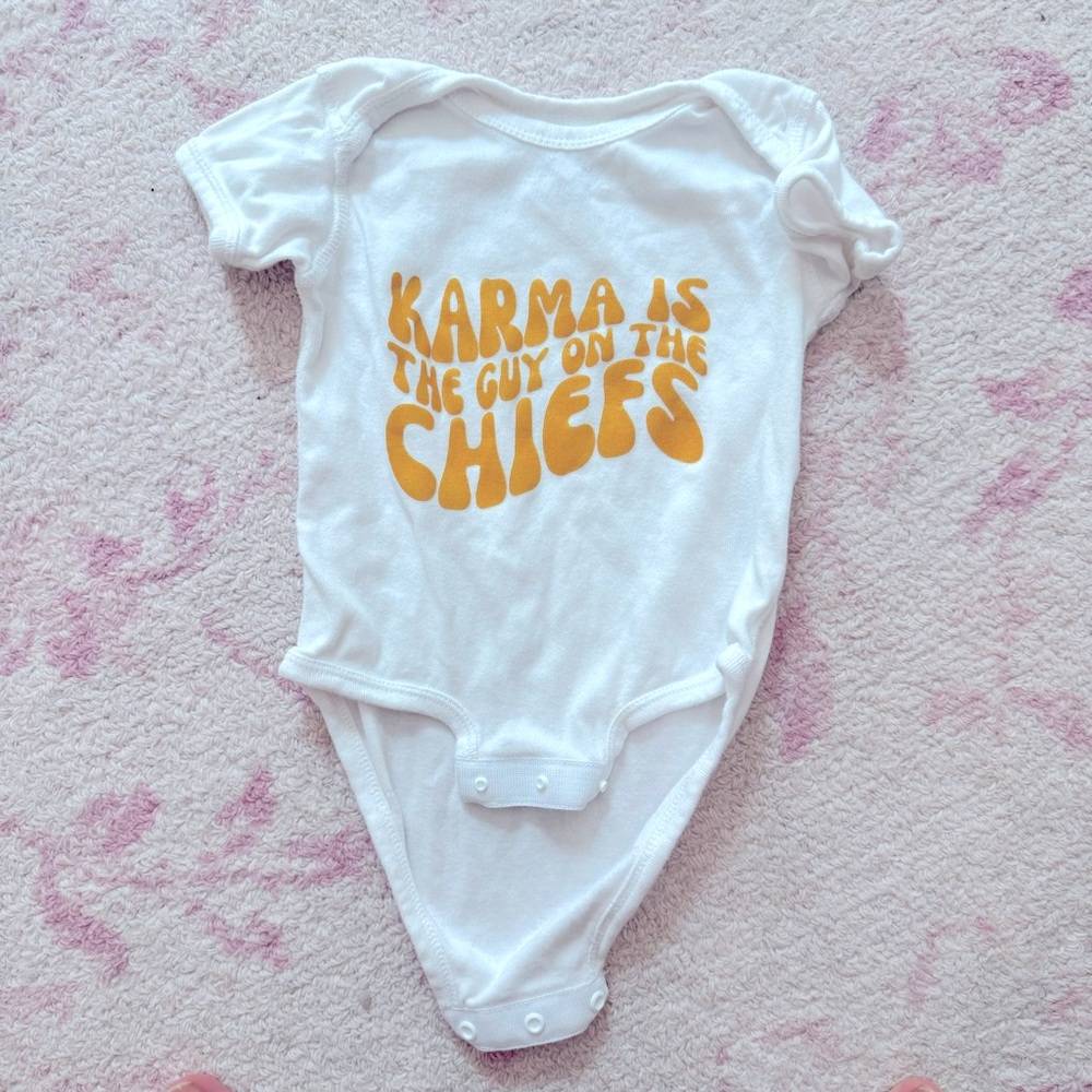 Karma is the guy on the chiefs Onesie